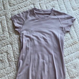 Purpleish pink lululemon swiftly teach shirt (slight damage on back)